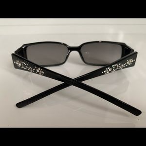 Dior sunglasses in black with silver gems in the back of the sunglasses